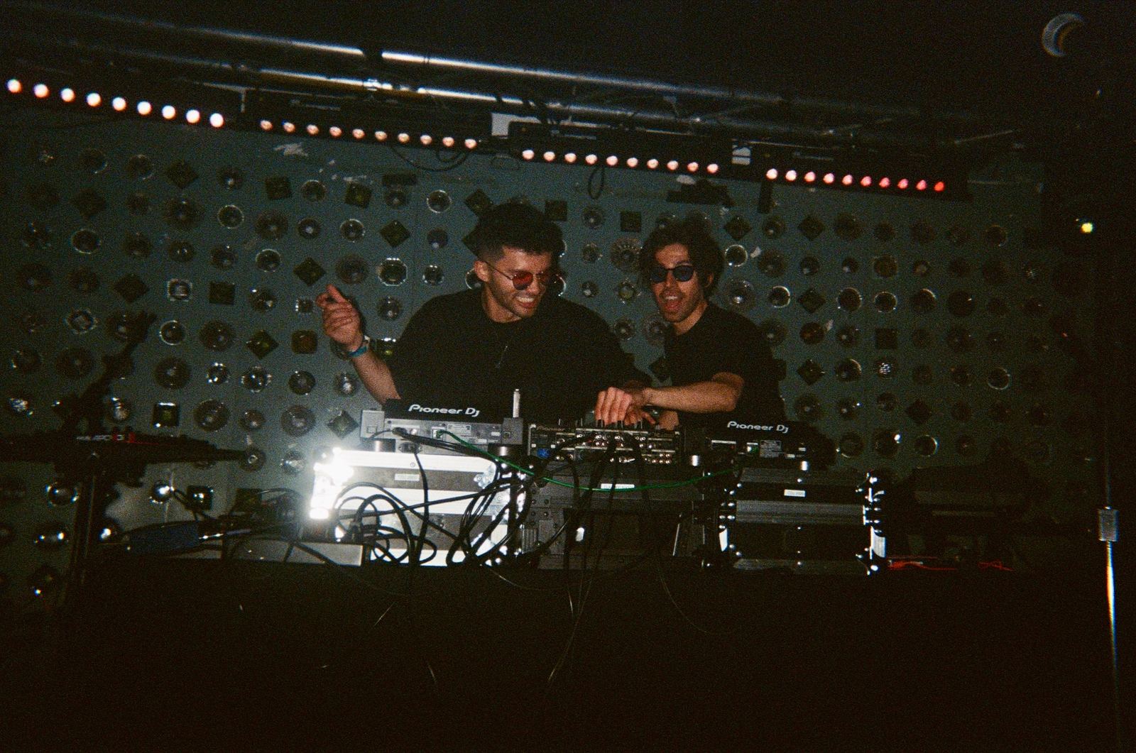 tradeoff laughing behind the decks